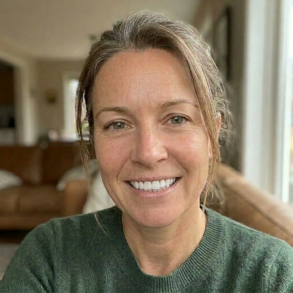 A patient's AI smile preview, sharpening as the form is completed